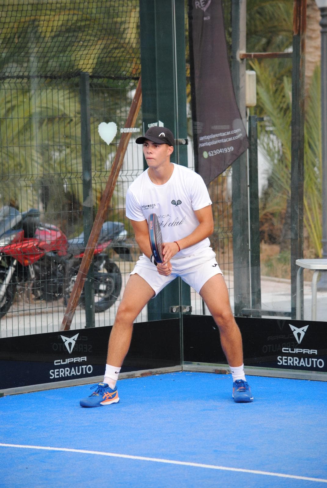 Alvaro on a padel court, ready to receive